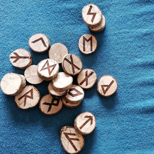 Elder Futhark Runes scattered on surface